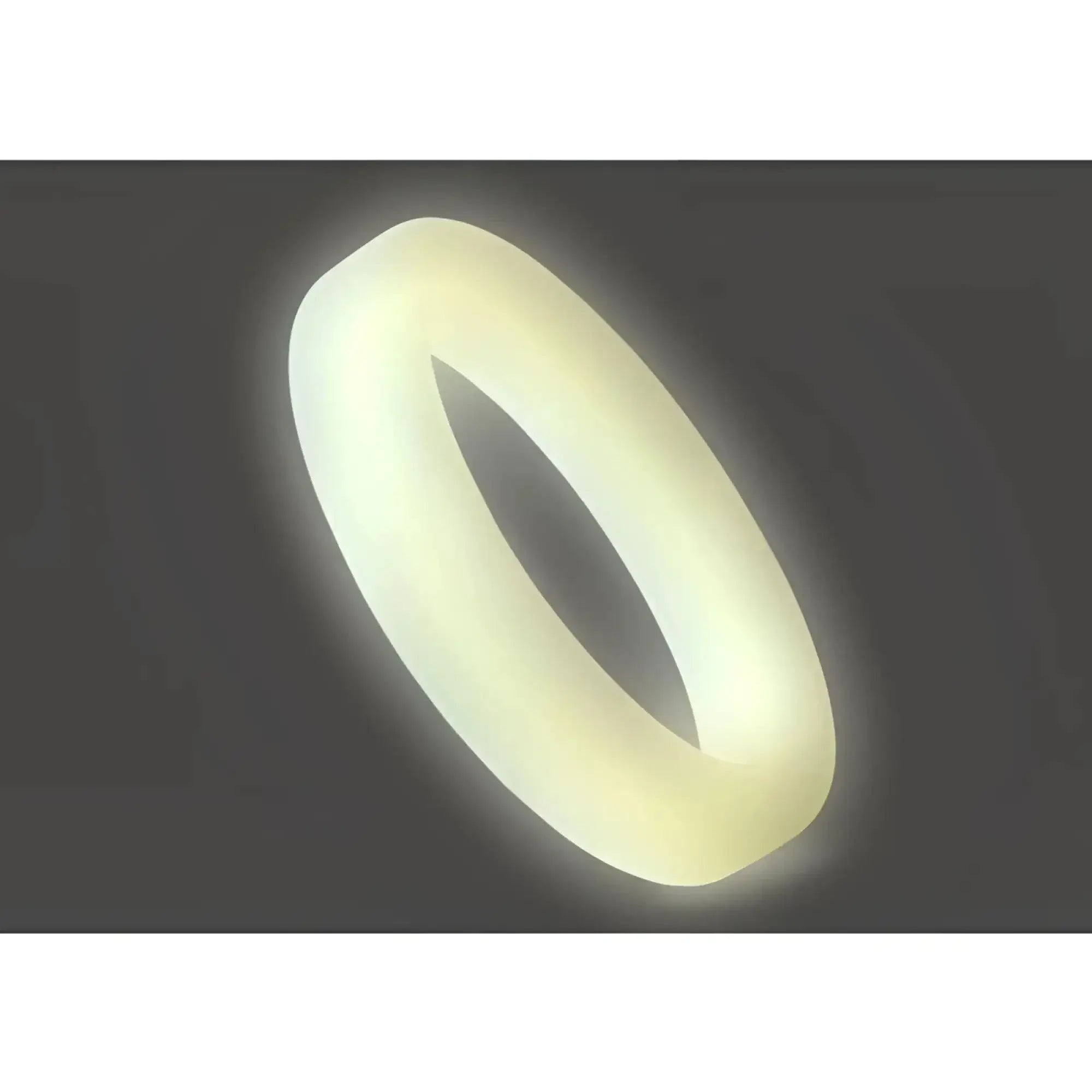 A soft glowing off-white silicone perfectfit classic medium stretch penis ring with a smooth rounded design