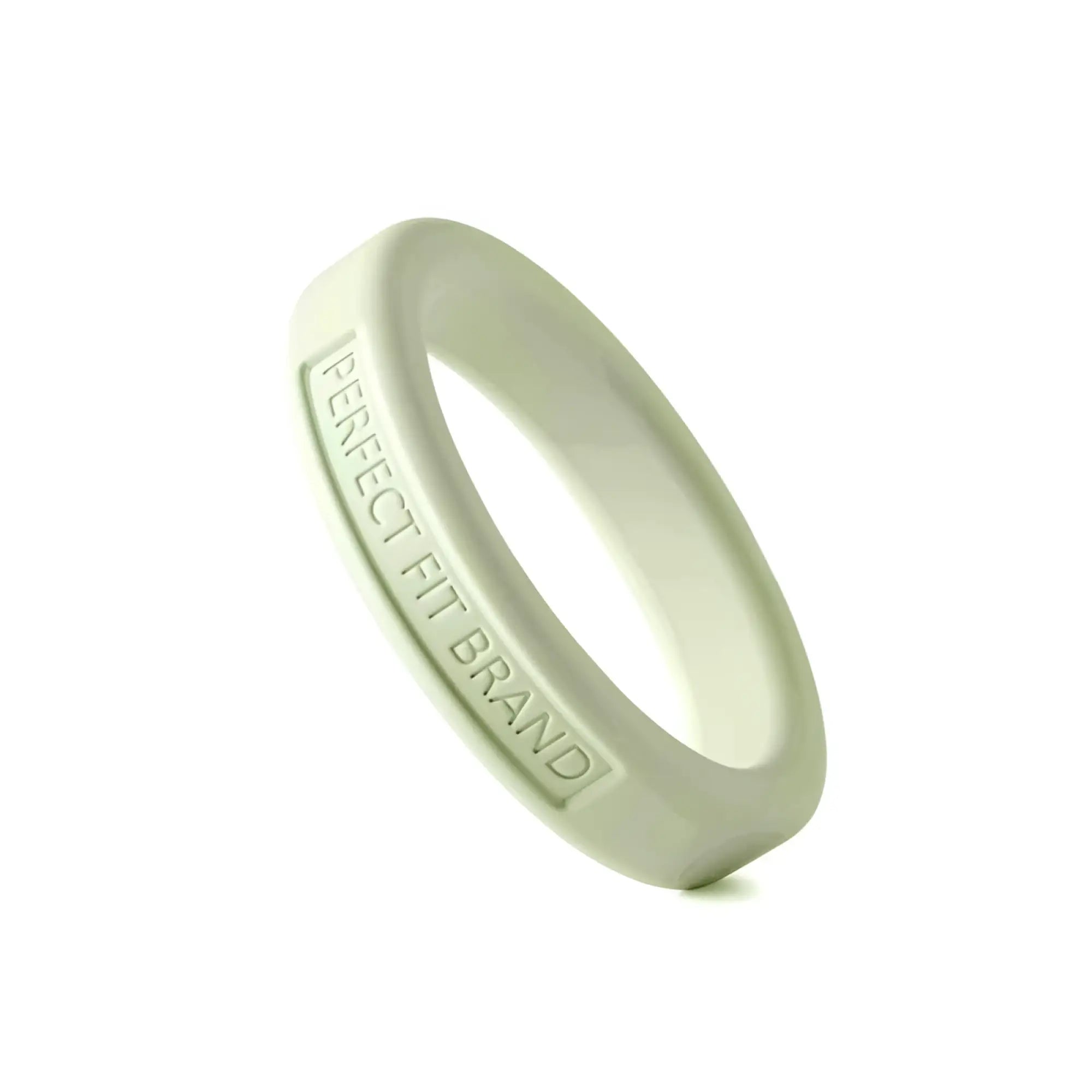 A sleek matte white silicone penis ring with perfect fit brand engraving glow in the dark medium 44mm stretch