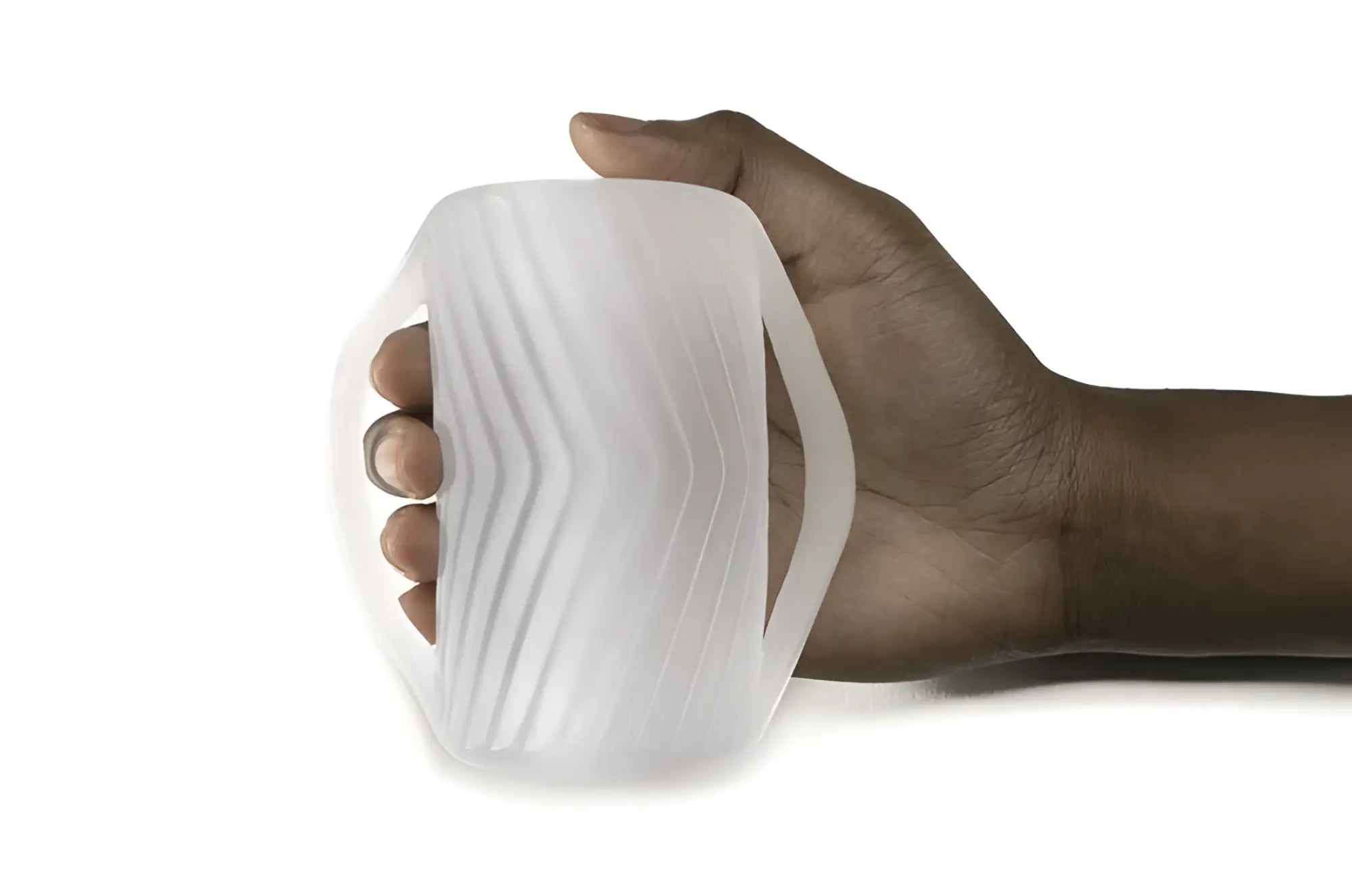 White translucent silicone grip with wavy ridged texture and integrated handle for perfectfit male masturbator gripped