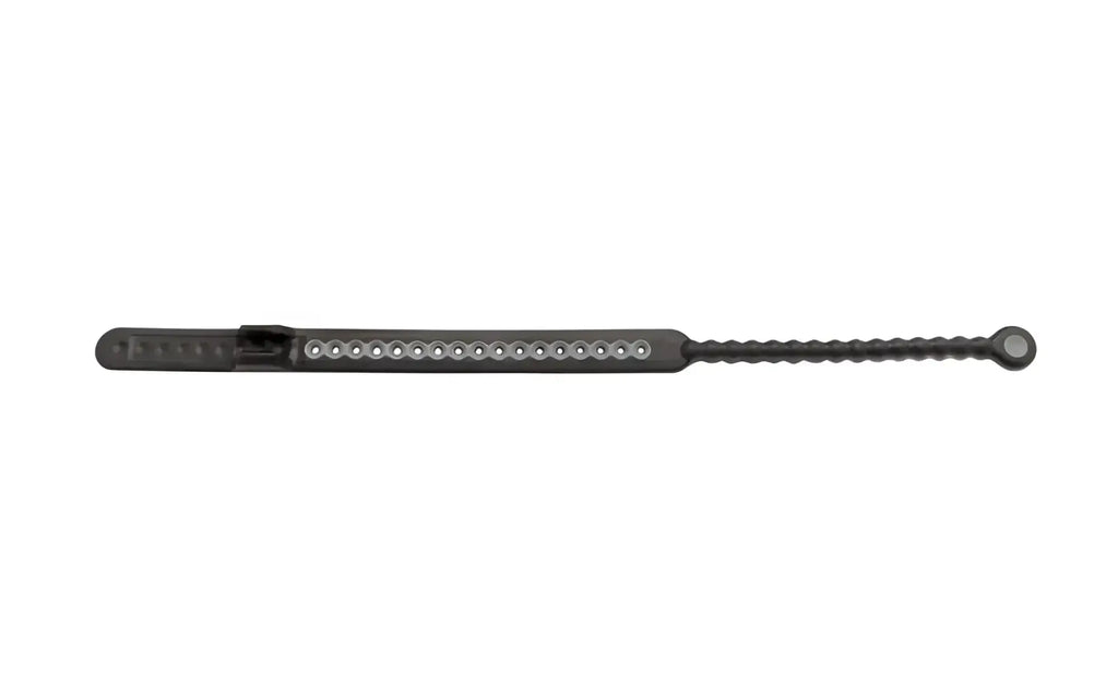 PerfectFit Speed Shift black plastic cable tie with textured grip and row of small round metallic beads along its length