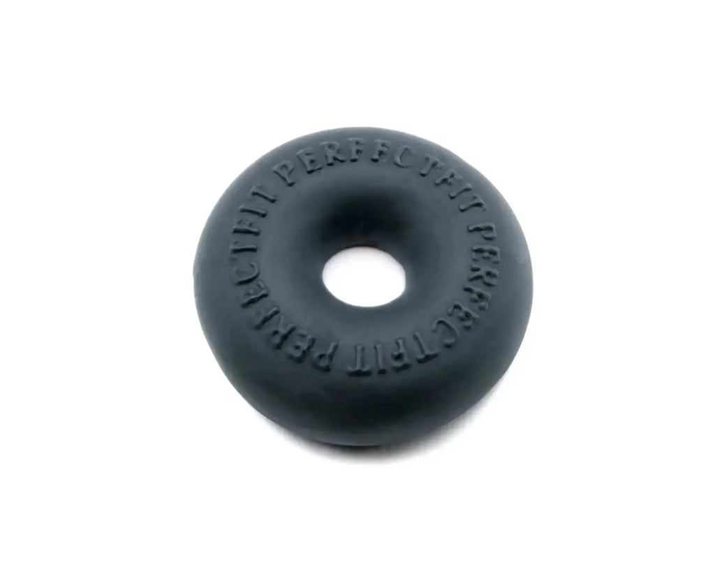 Black rubber donut with embossed text around its edge from the PerfectFit Stackit Black product line