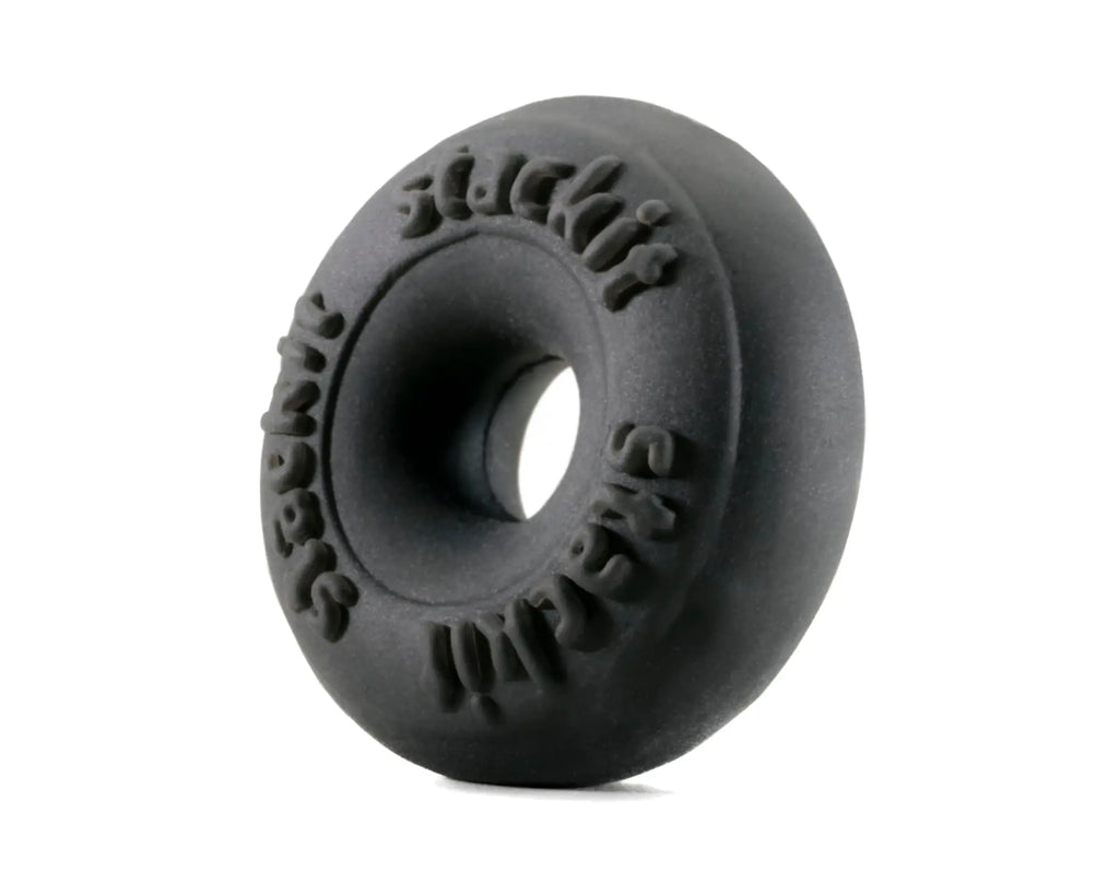 Black rubber donut-shaped PerfectFit Stackit with embossed text around the circumference for secure stacking