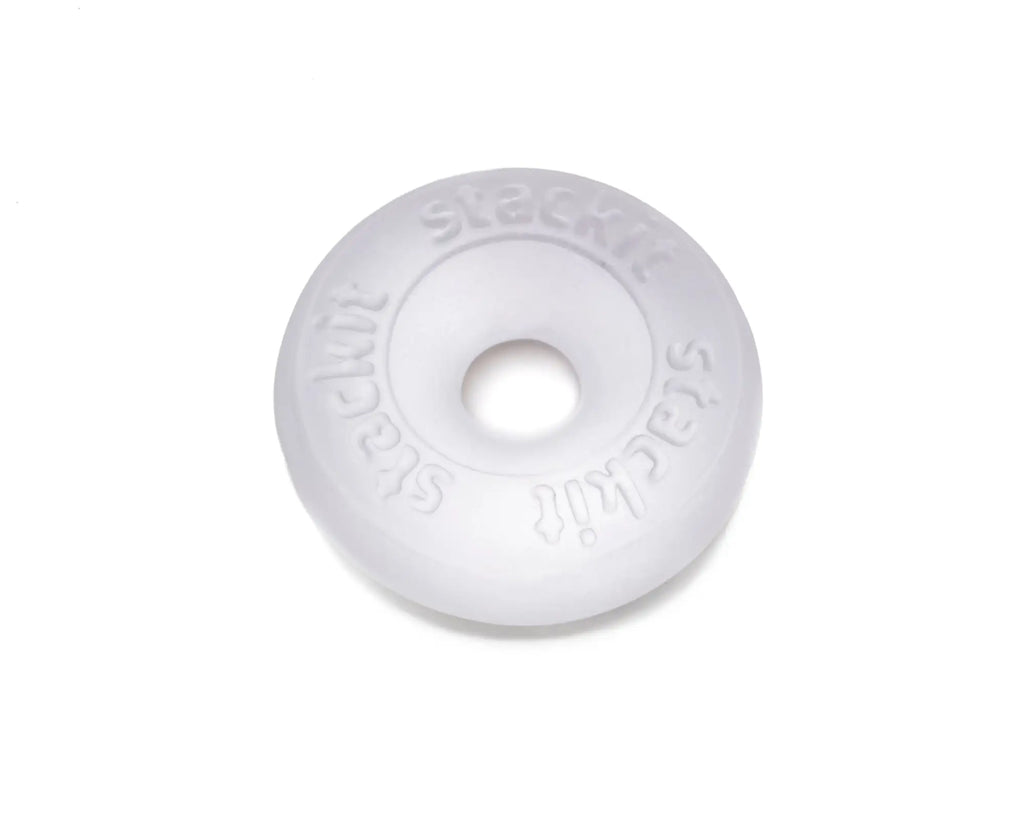 Perfectfit stackit clear white translucent plastic donut-shaped object with stackit embossed around its edge