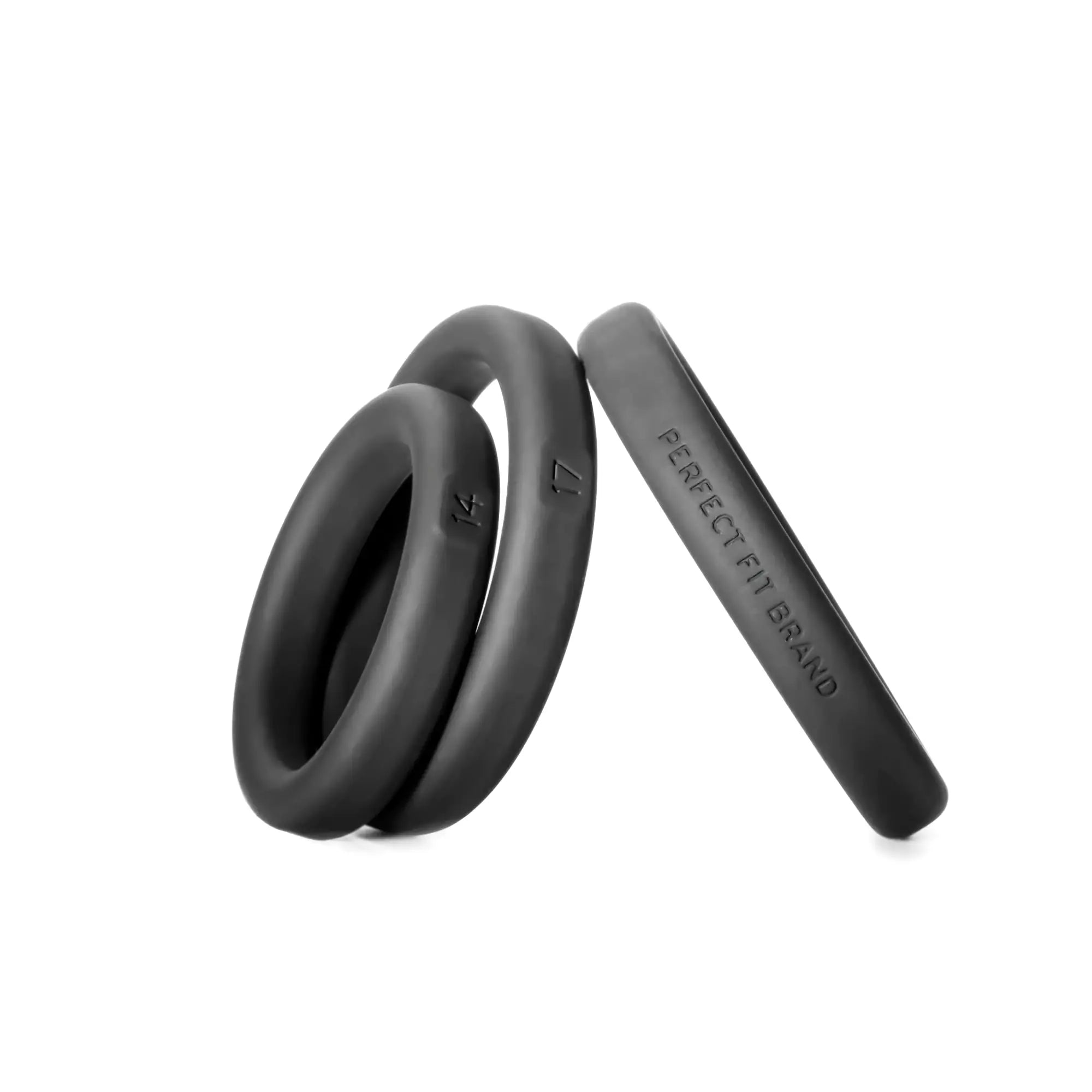 Black silicone rings with engraved size markings and perfectfit brand text from xact-fit mixed 3 ring kit