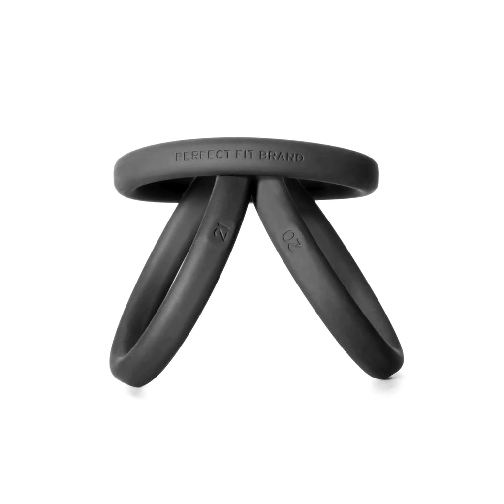 Black silicone stool with three curved legs and circular seat branded perfect fit brand for durable seating