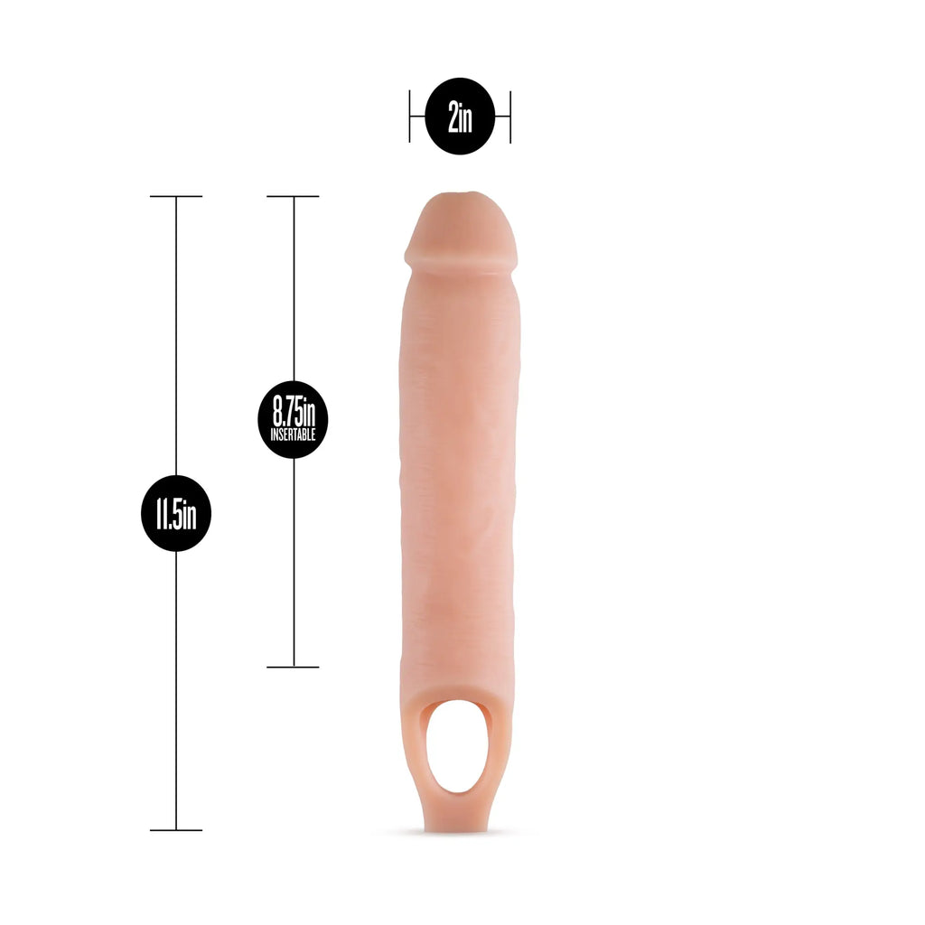 Peach-colored silicone dildo with ring base and measurements in performance 11.5in cock sheath penis extender vanilla