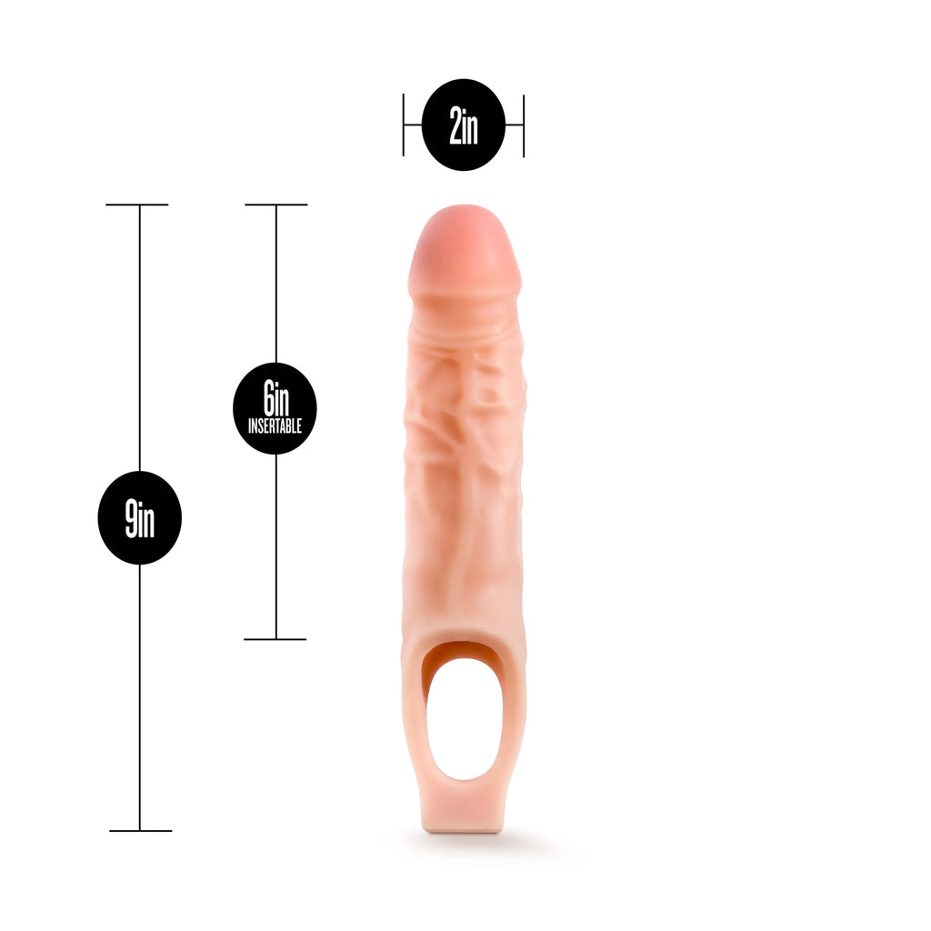Pink silicone performance 9in cock sheath penis extender with textured surface and ring at base vanilla color