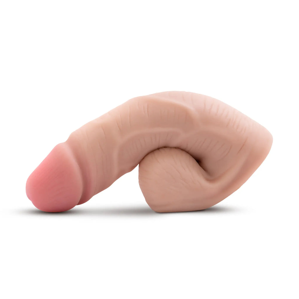 Performance packer vanilla 5in realistic flesh-toned silicone phallus toy with darker pink head and textured surface