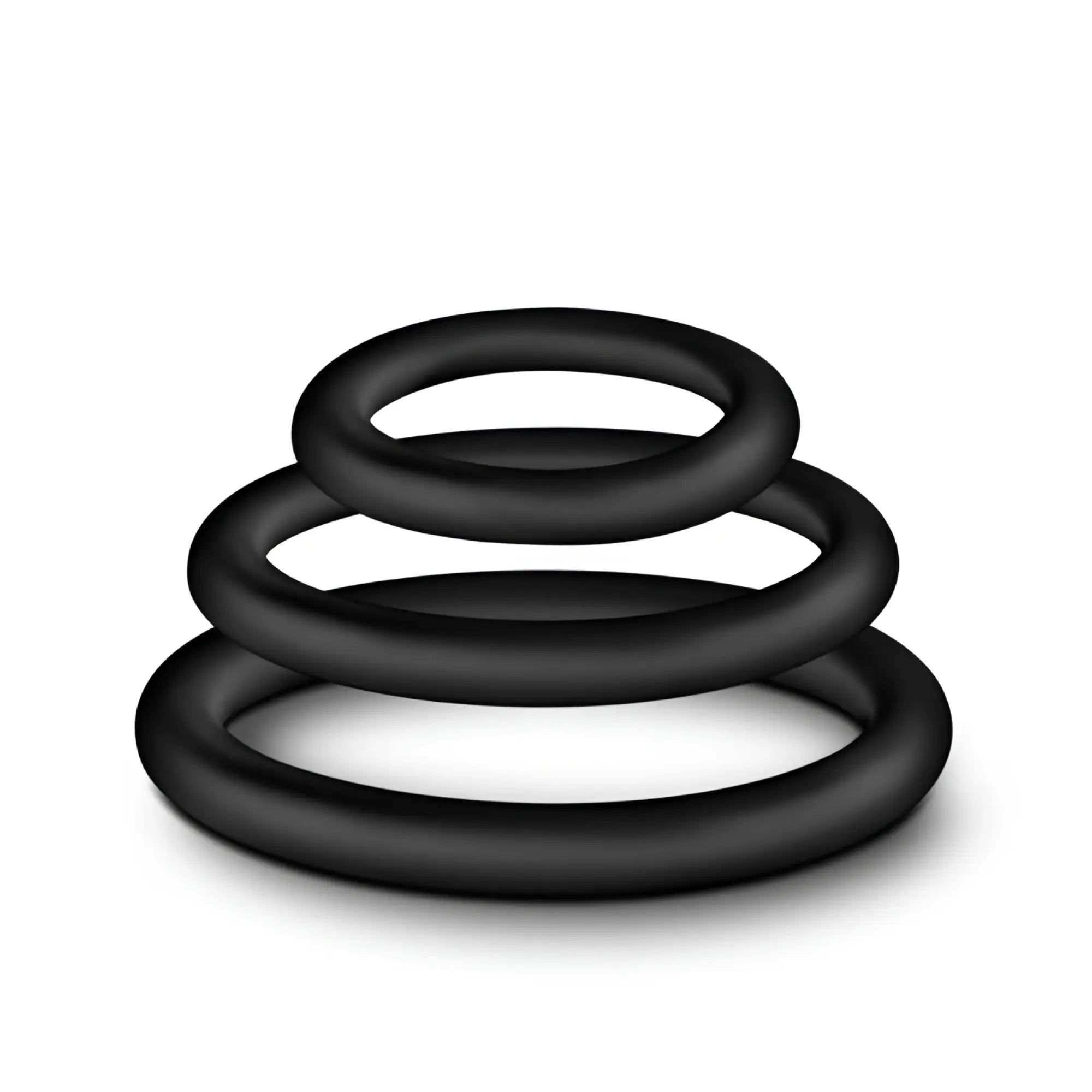 Black silicone performance cock ring set with three graduated sizes stacked in a spiral for performance enhancement