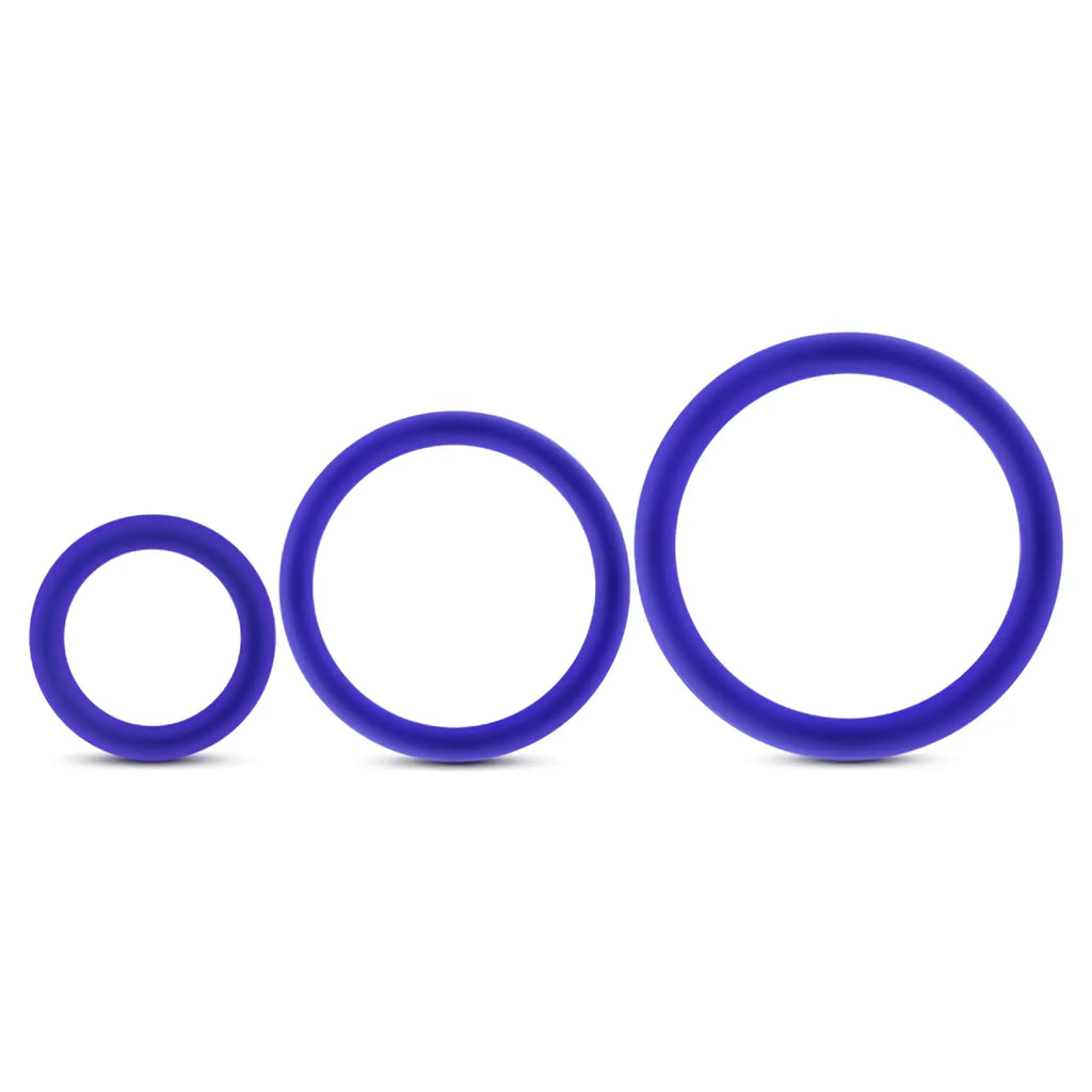 Set of three indigo purple silicone cock rings in varying sizes from the performance silicone 3 pc set