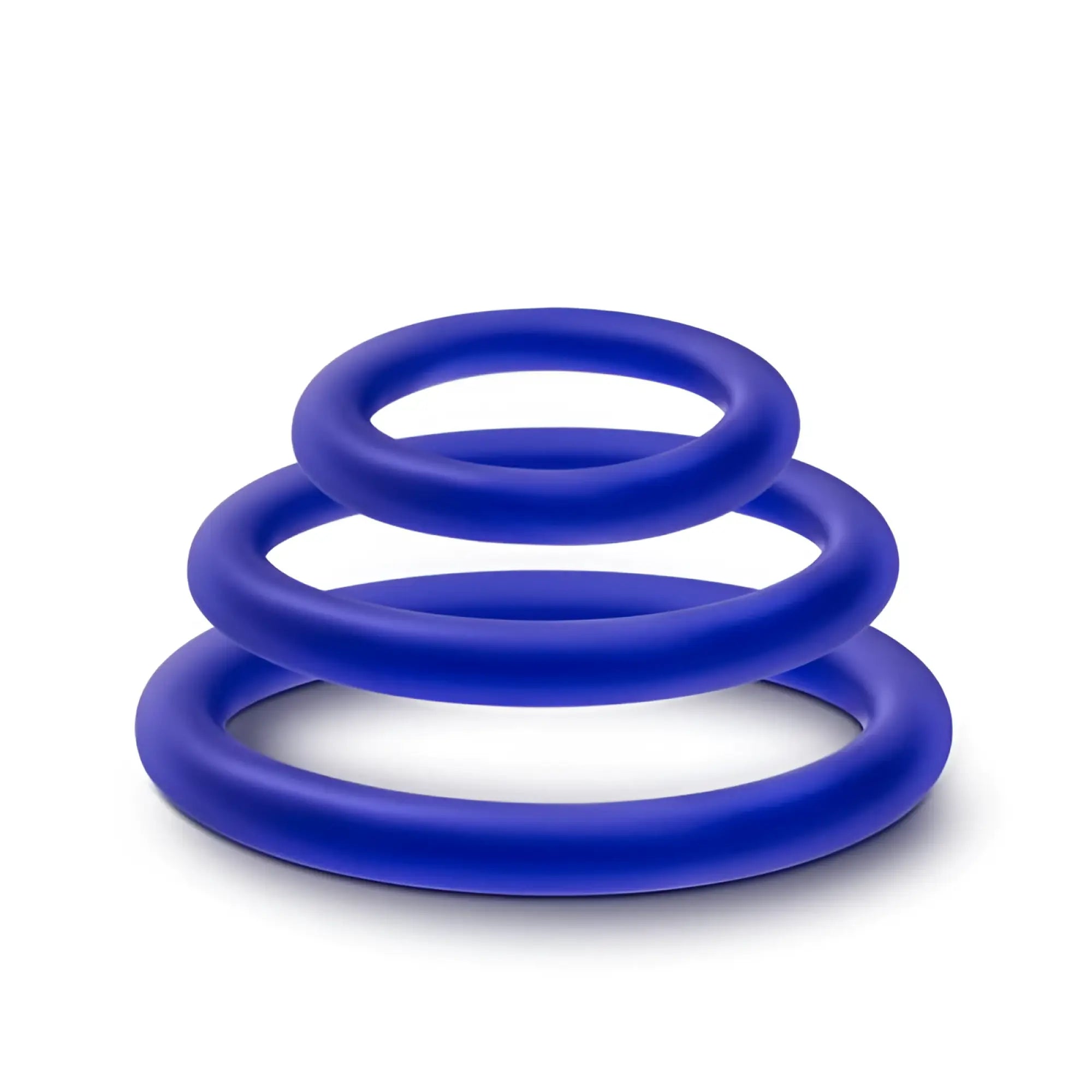 Set of three vibrant royal blue silicone cock rings in graduated sizes from the performance indigo 3 pc set