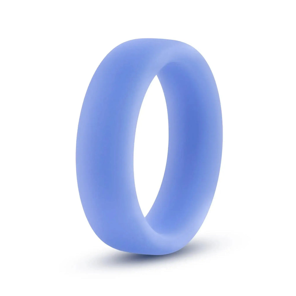 A sleek light blue performance silicone glo cock ring with a smooth matte finish and solid design