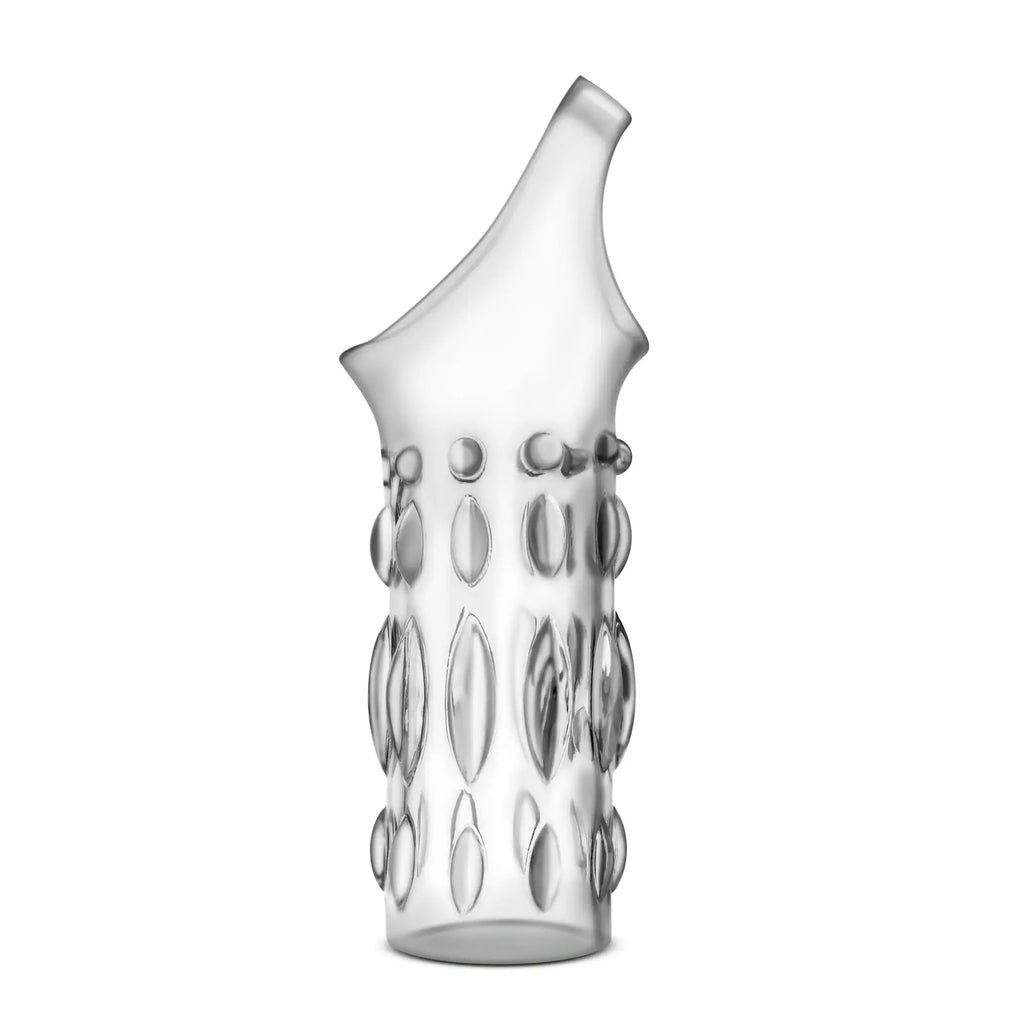 Clear glass vase with modern vertical rows of raised oval and circular embellishments on its body