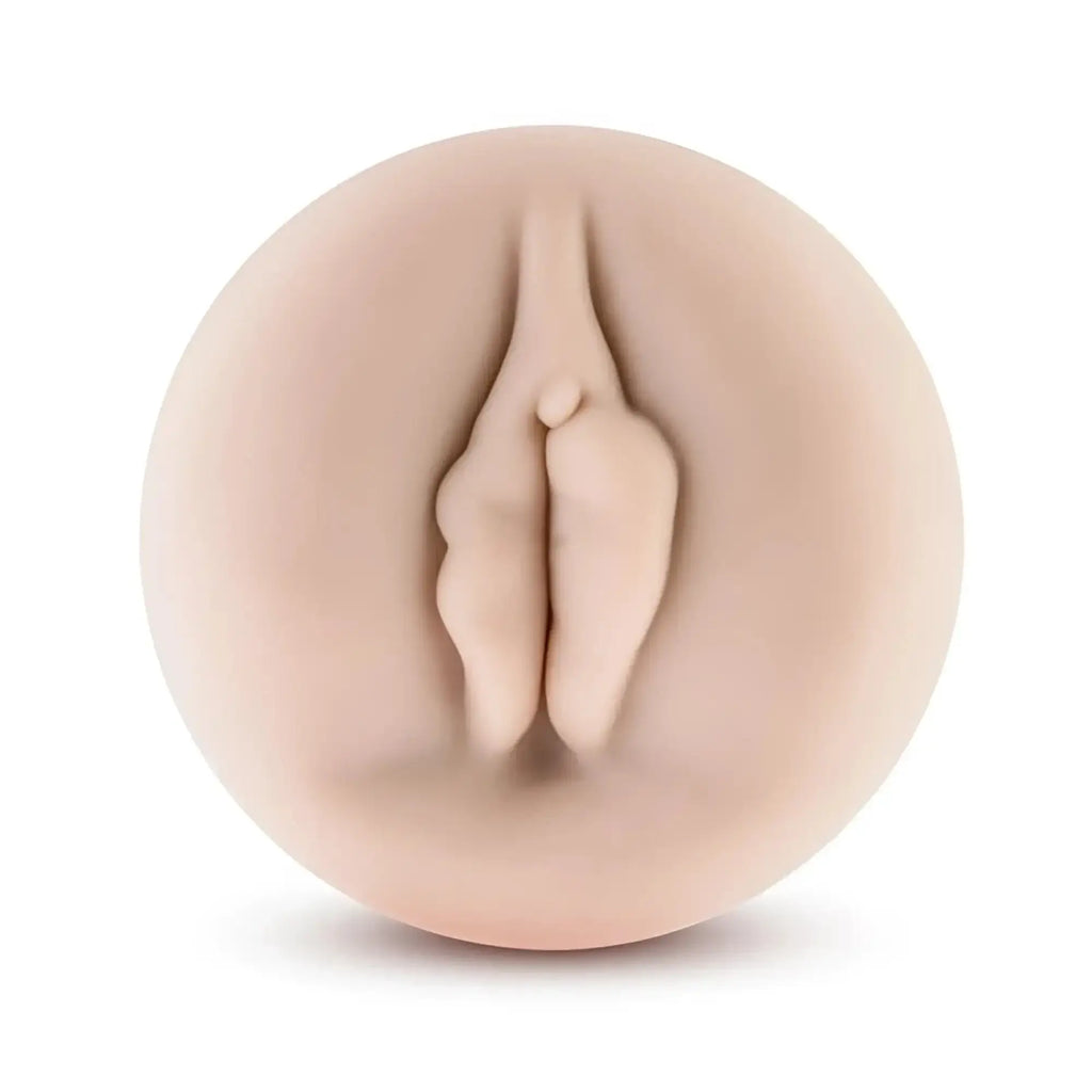 Beige silicone vaginal toy with realistic anatomical design performance universal pump sleeve pussy front view