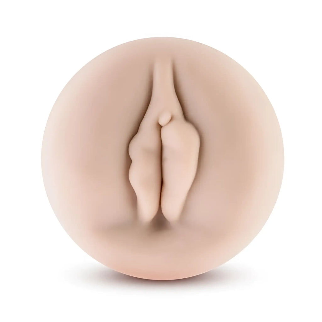 Beige silicone vaginal toy with realistic anatomical design performance universal pump sleeve pussy front view