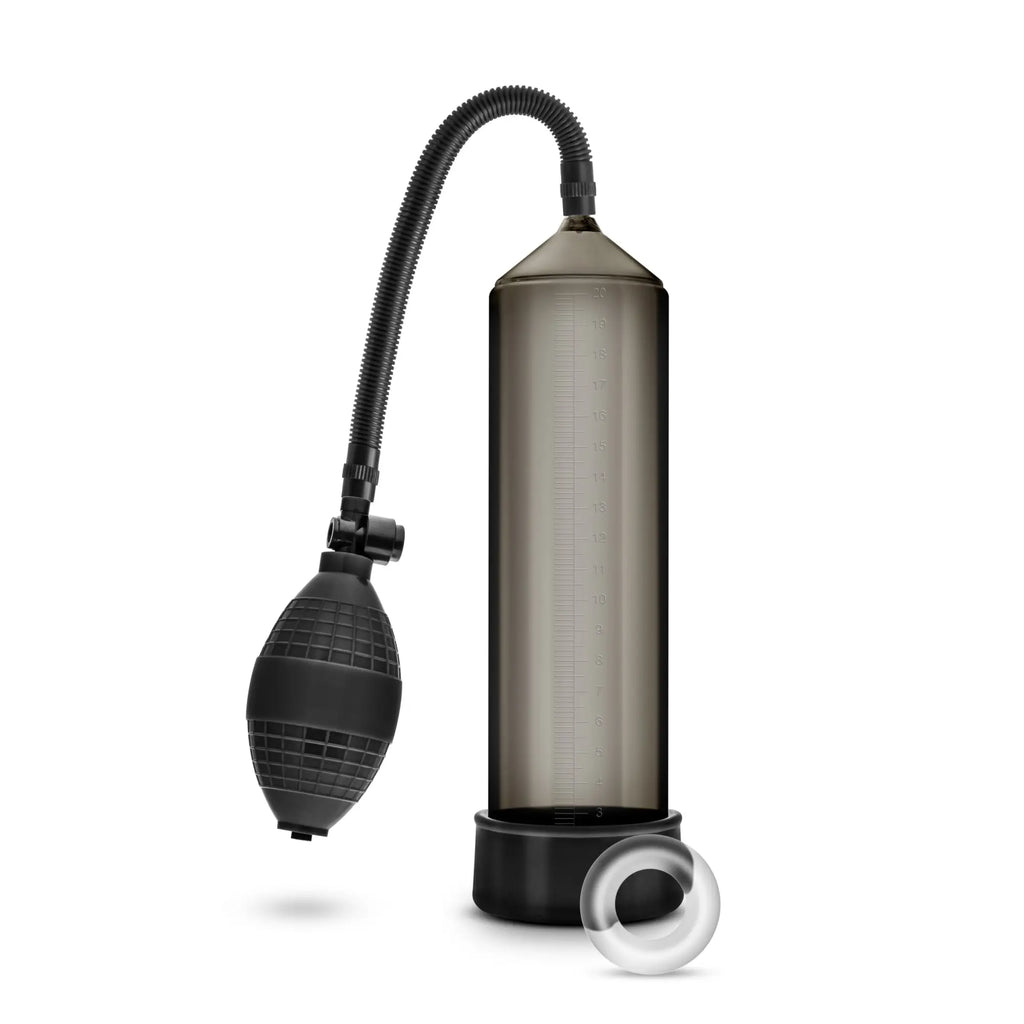Performance vx101 male enhancement pump in black with translucent gray vacuum chamber flexible hose and clear plastic ring