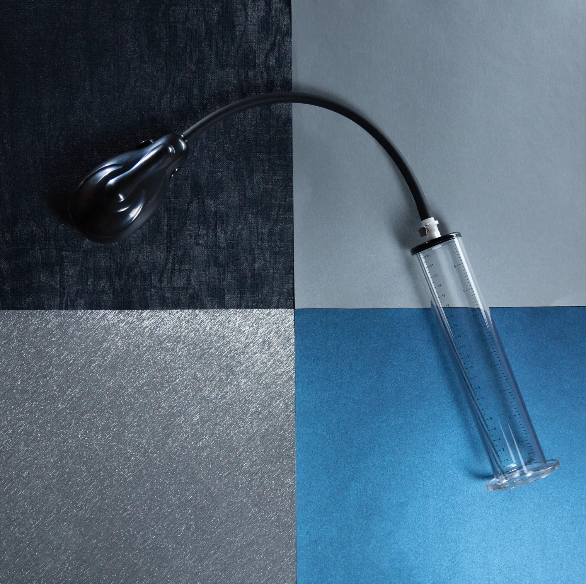 Black plastic syringe with clear glass barrel and measurement markings for performance vx9 auto penis pump clear