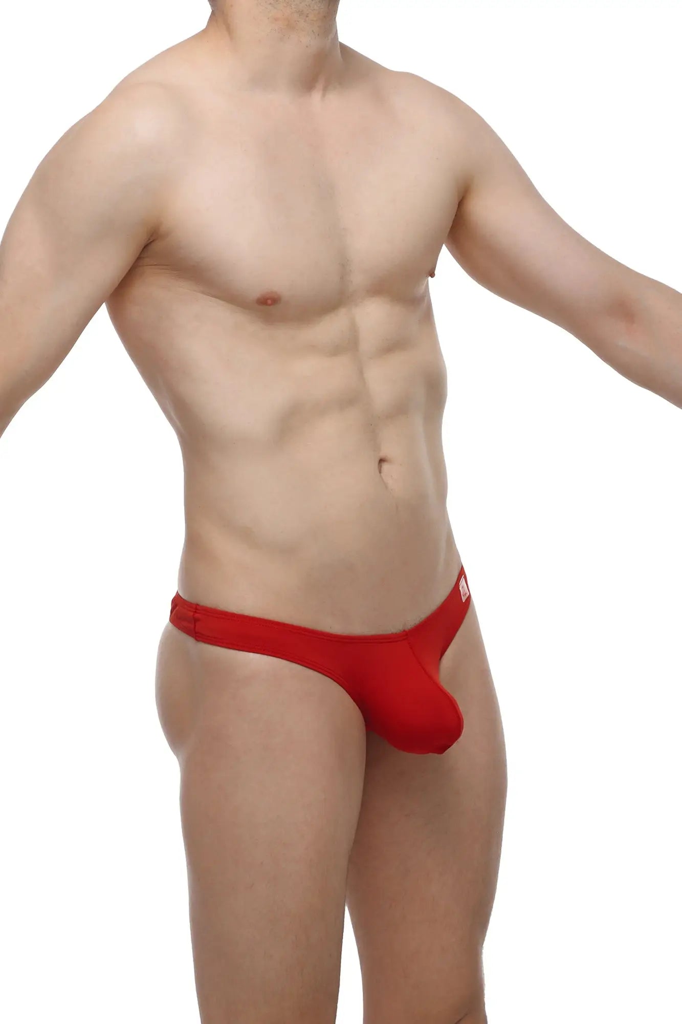 Red PetitQ bikini capri thong with smooth fabric finish and minimalistic design shown from the back side