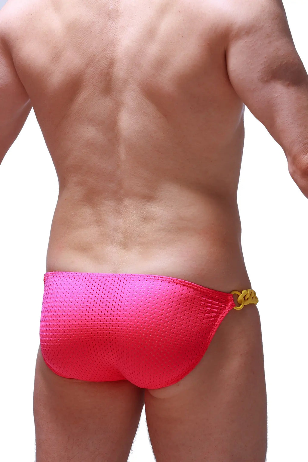 Bright pink mesh swim trunks with gold chain waistband accent from petitq bikini chains bee pink collection