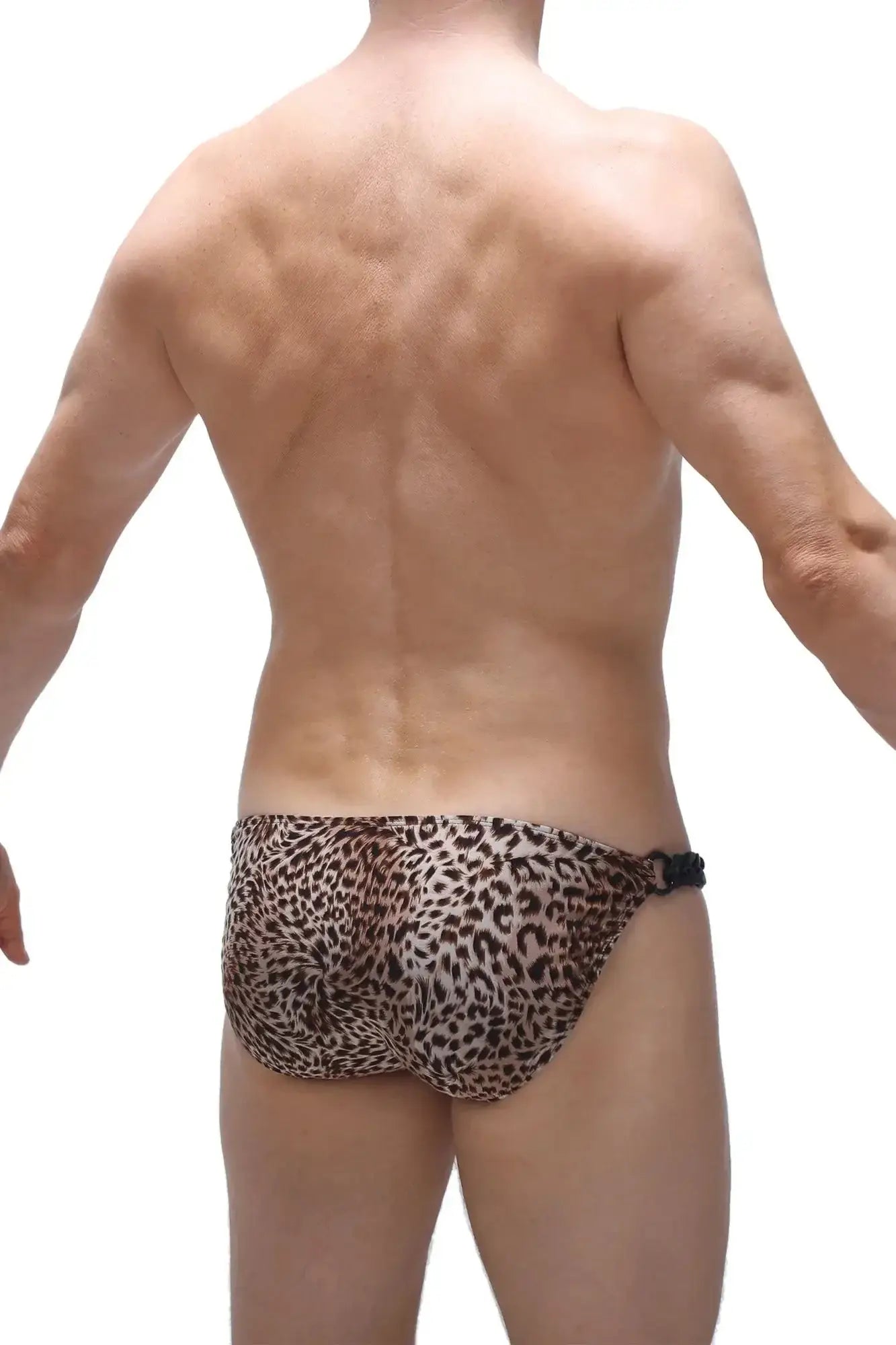 Leopard-print swim trunks with a black adjustable waistband from petitq bikini chains panthere collection