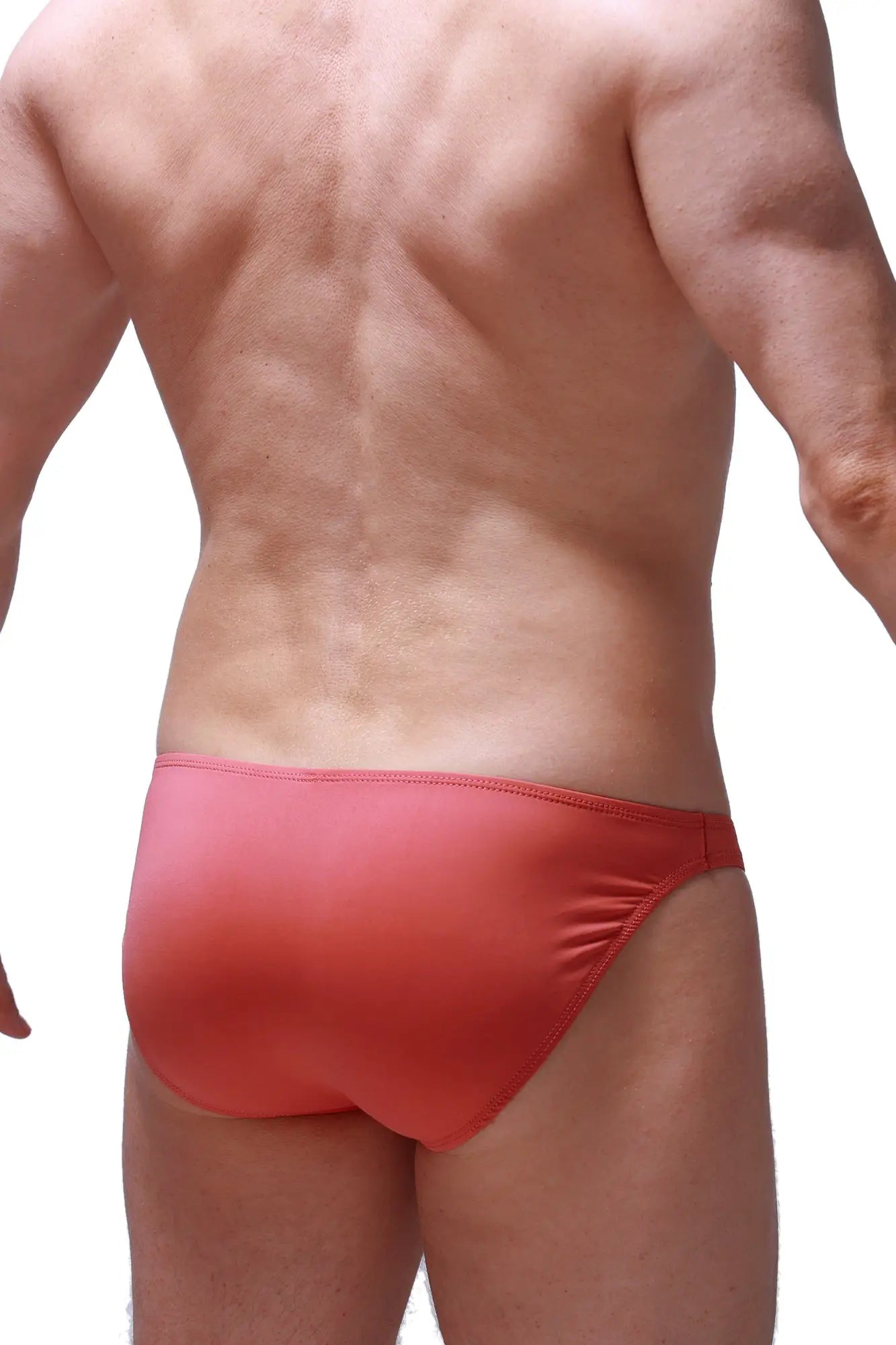Red PetitQ Bikini Dome Blush swim trunks with smooth stretchy fabric and subtle gradient finish