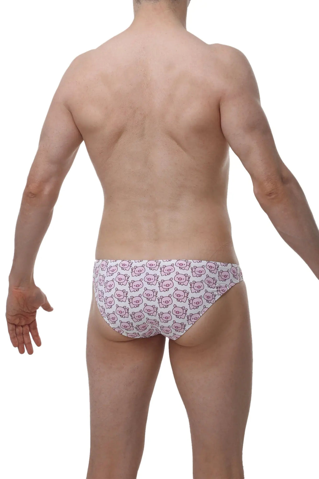 White PetitQ bikini briefs with a repeating pattern of pink cartoon pig faces for casual wear