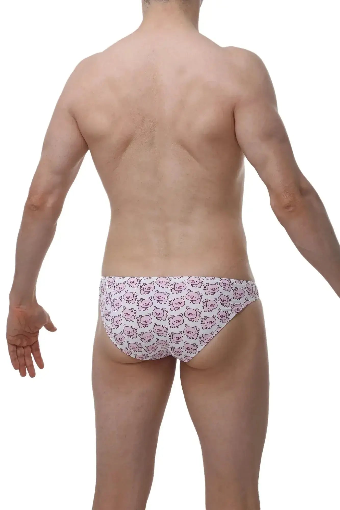 White PetitQ bikini briefs with a repeating pattern of pink cartoon pig faces for casual wear