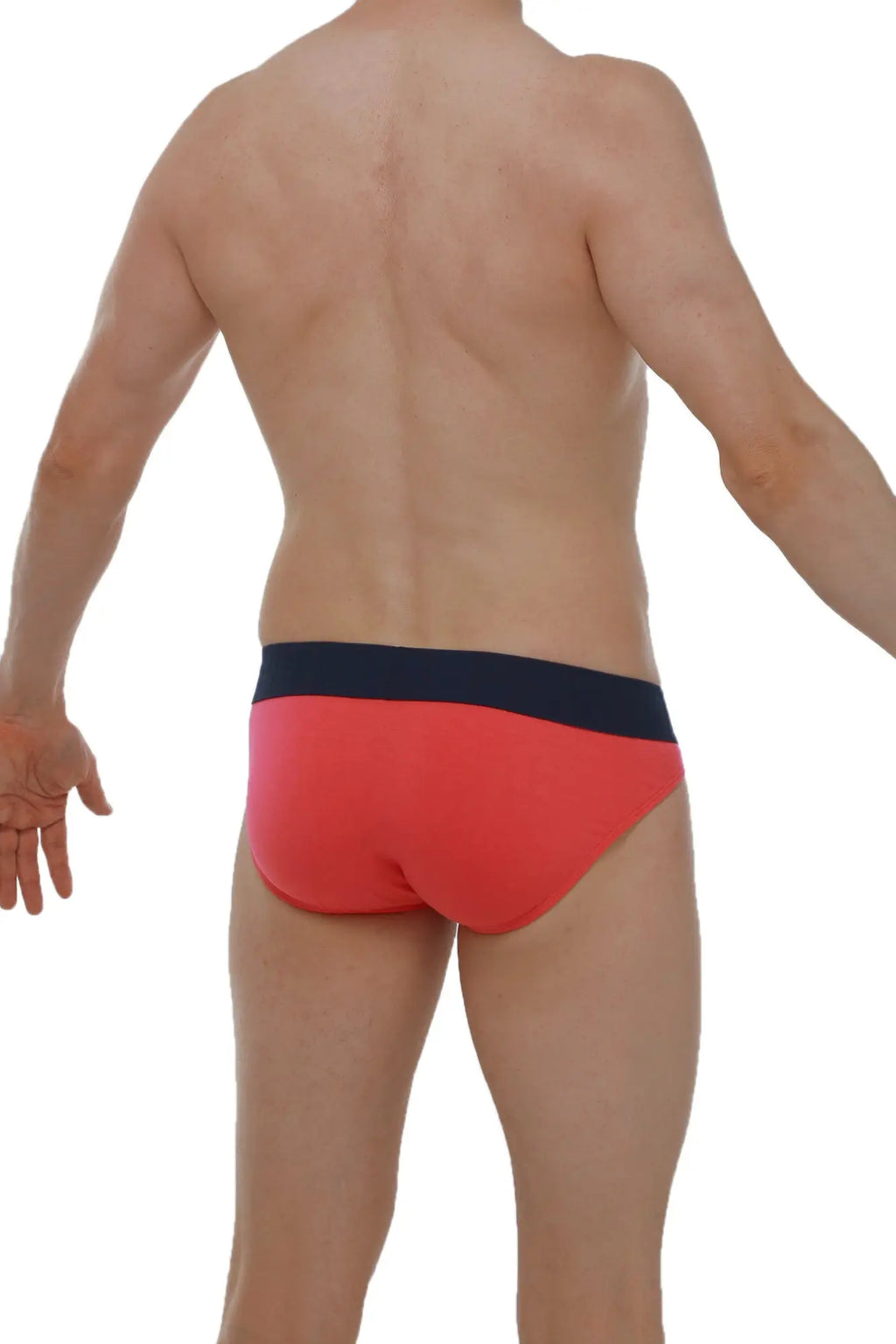 Red briefs with a navy blue waistband from petitq bikini mega bulge fuchsia featuring a supportive design