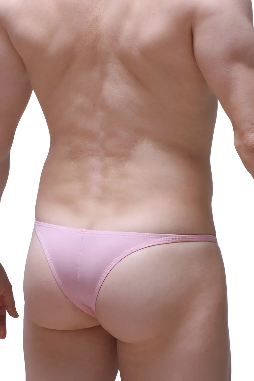 Pink thong bikini made of smooth stretchy fabric in tea rose color from petitq bikini plellis skine collection