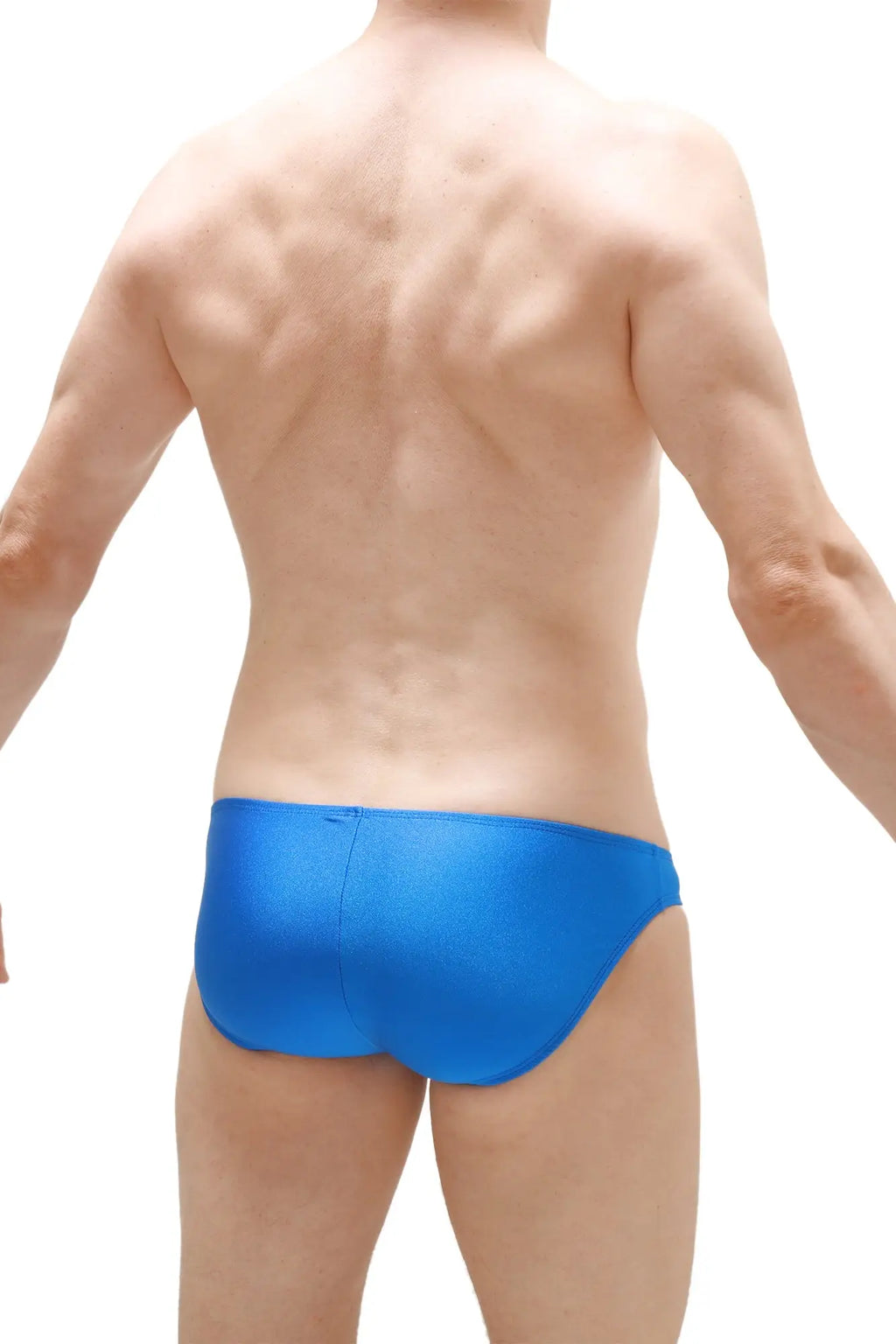 Bright blue petitq bikini taik joe swim trunks with sleek smooth form-fitting design for swimming and beachwear