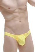 Bright yellow petitq bikini taik joe men’s swim trunks with snug fit and small red logo on waistband