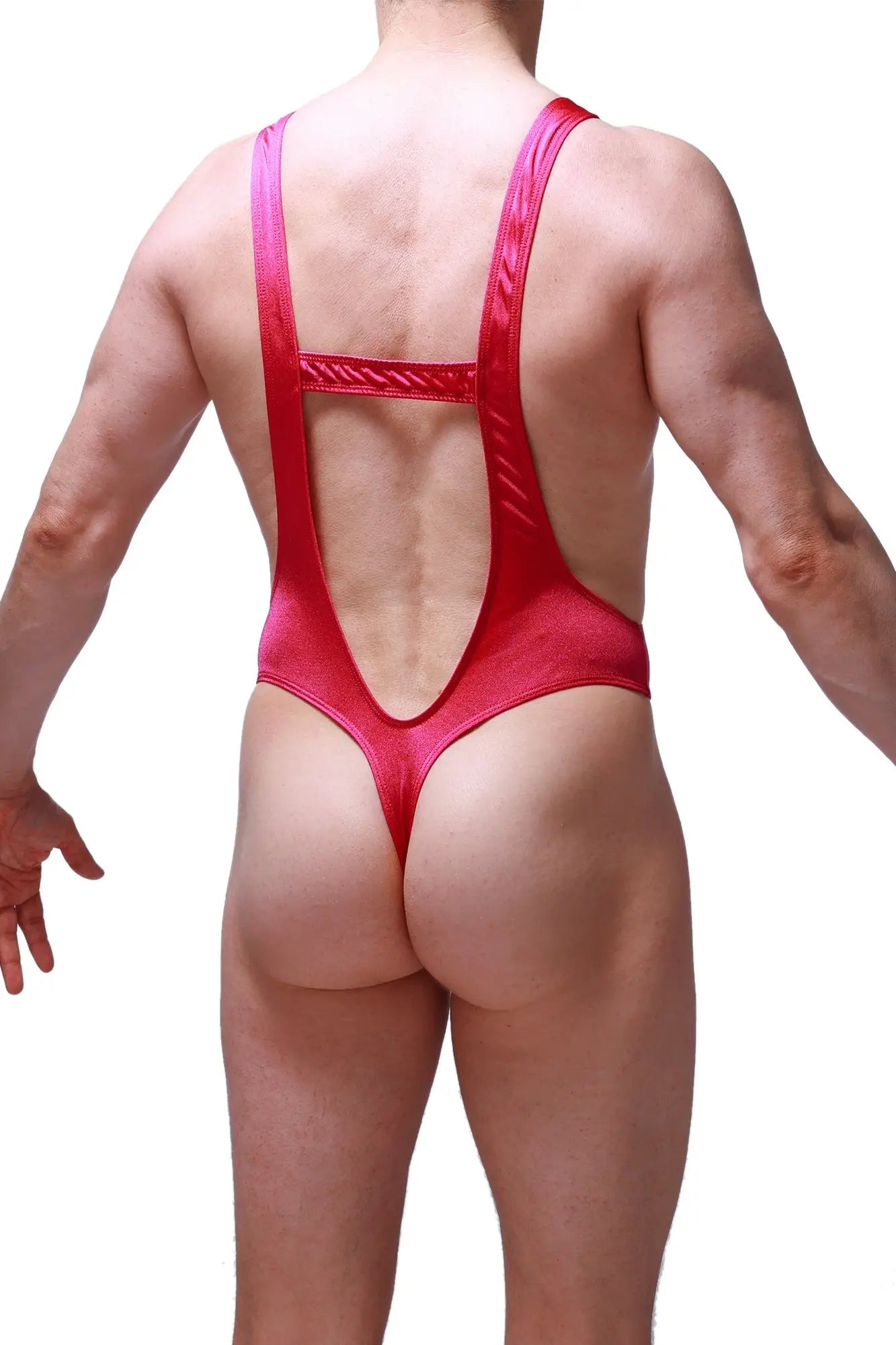 A vibrant red shiny petitq bodysuit thong with a daring back cutout and thin shoulder straps from gonzac joe framboise