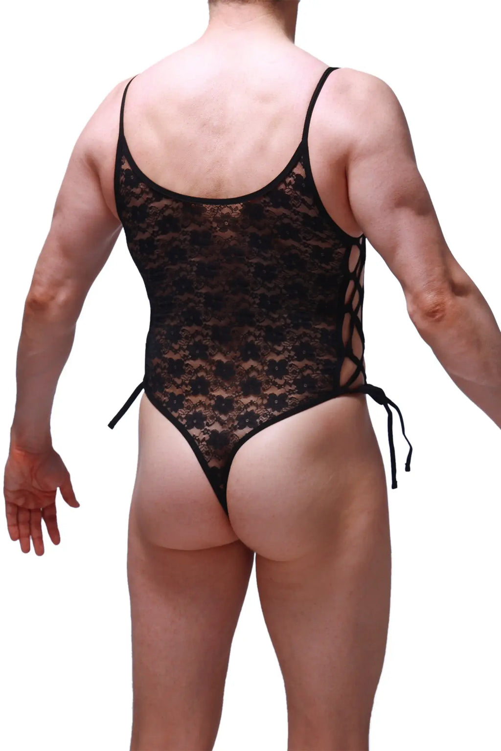 Petitq bodythong lacets lace black features a black lace bodysuit with floral pattern and side ties