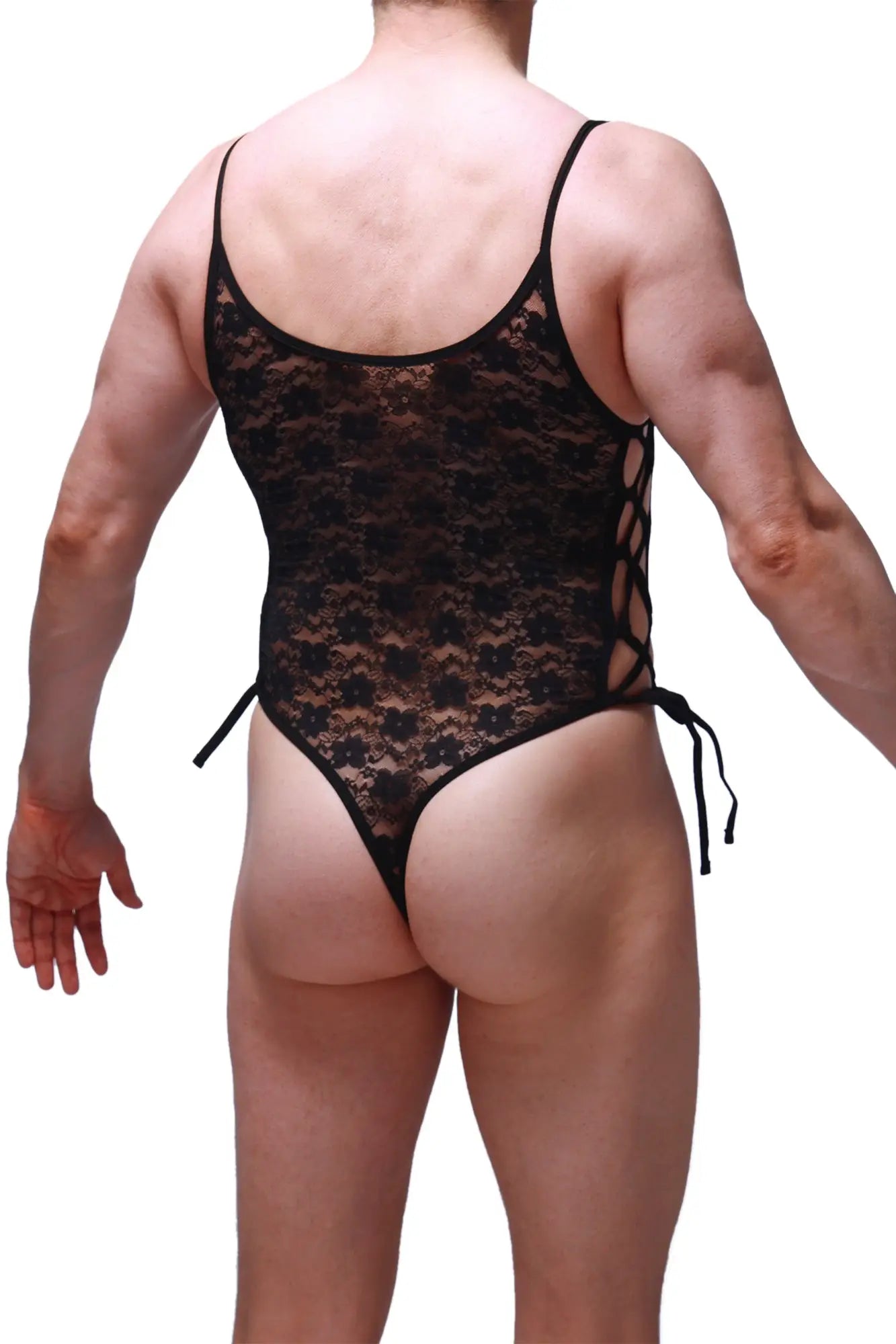 Petitq bodythong lacets lace black features a black lace bodysuit with floral pattern and side ties