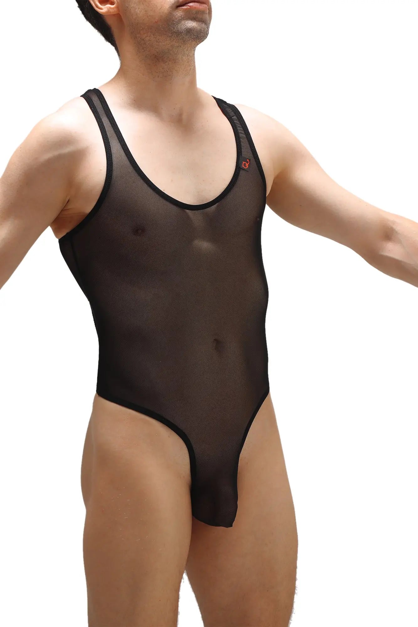 PetitQ Bodythong Nexon Net black sheer mesh one-piece swimsuit with black trim and small red logo on the shoulder