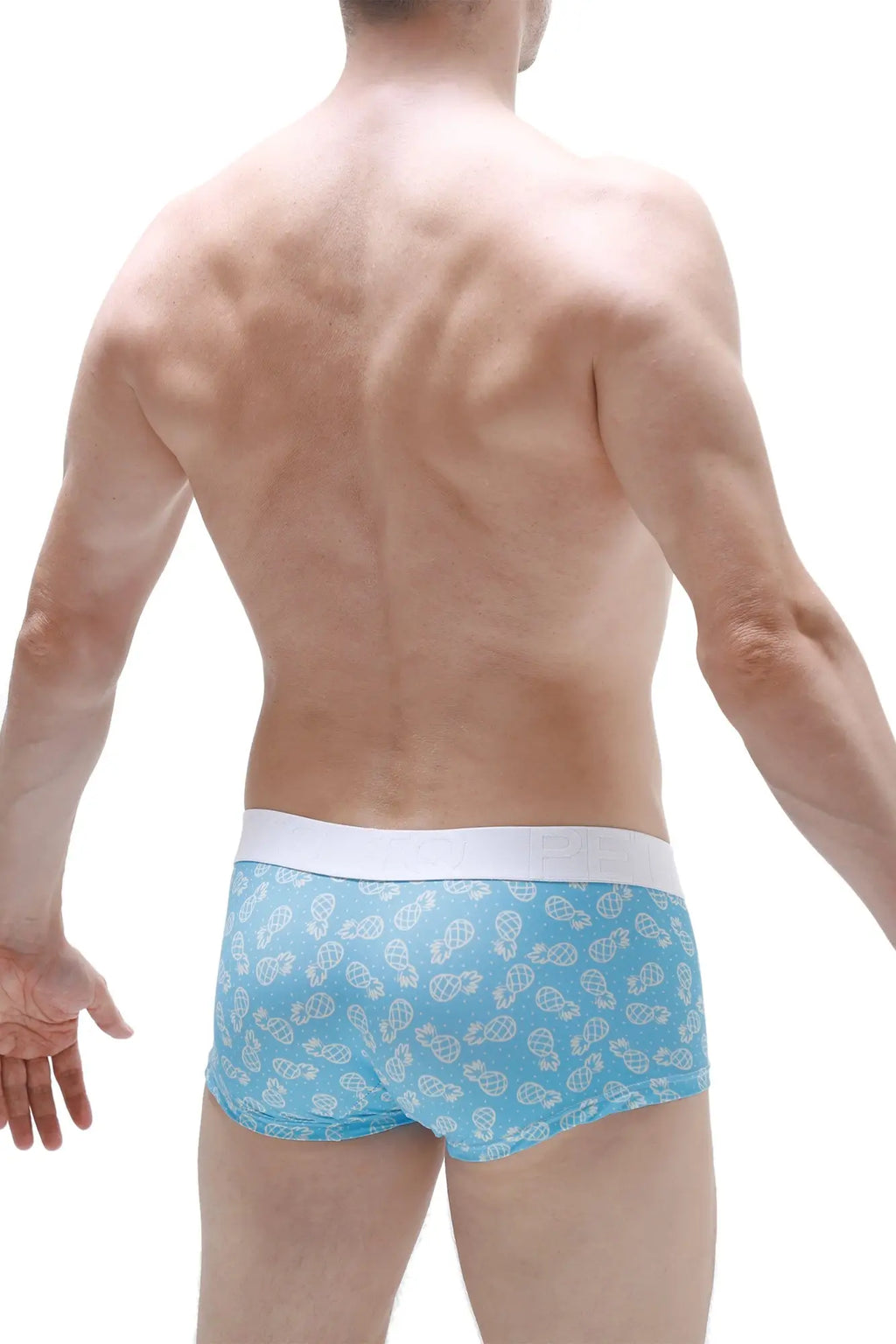 Light blue PetitQ boxer briefs with white waistband and small stylized cartoon characters pattern