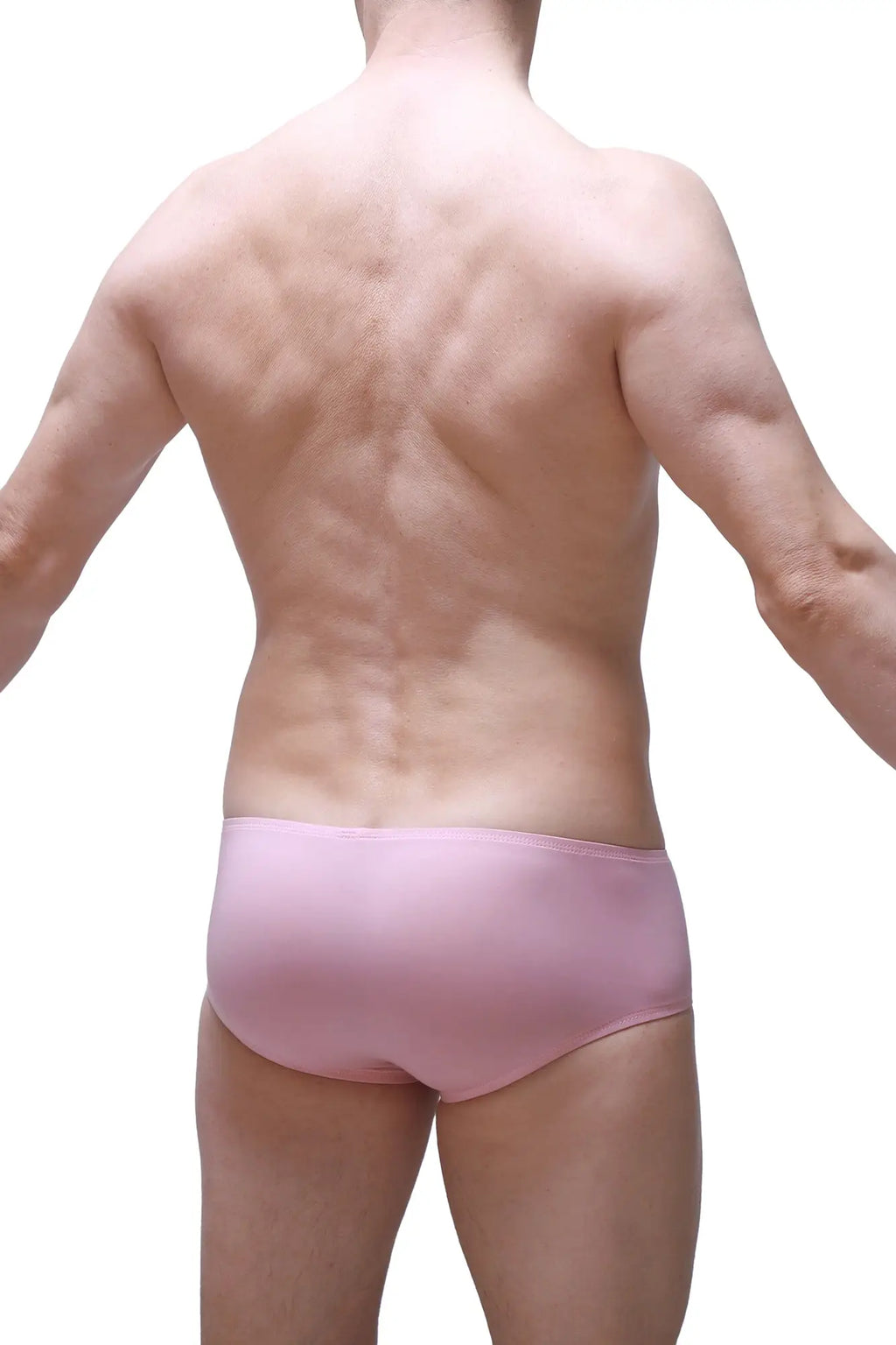 A pair of soft pink petitq boxer chill skine briefs with smooth, form-fitting design in tea rose color