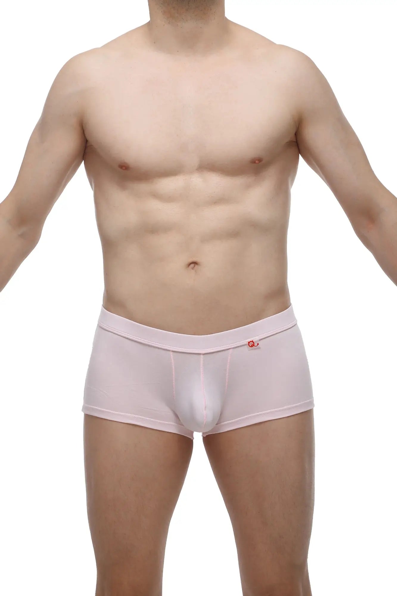 Light pink PetitQ boxer briefs made of smooth bamboo fabric with a small red logo on the waistband