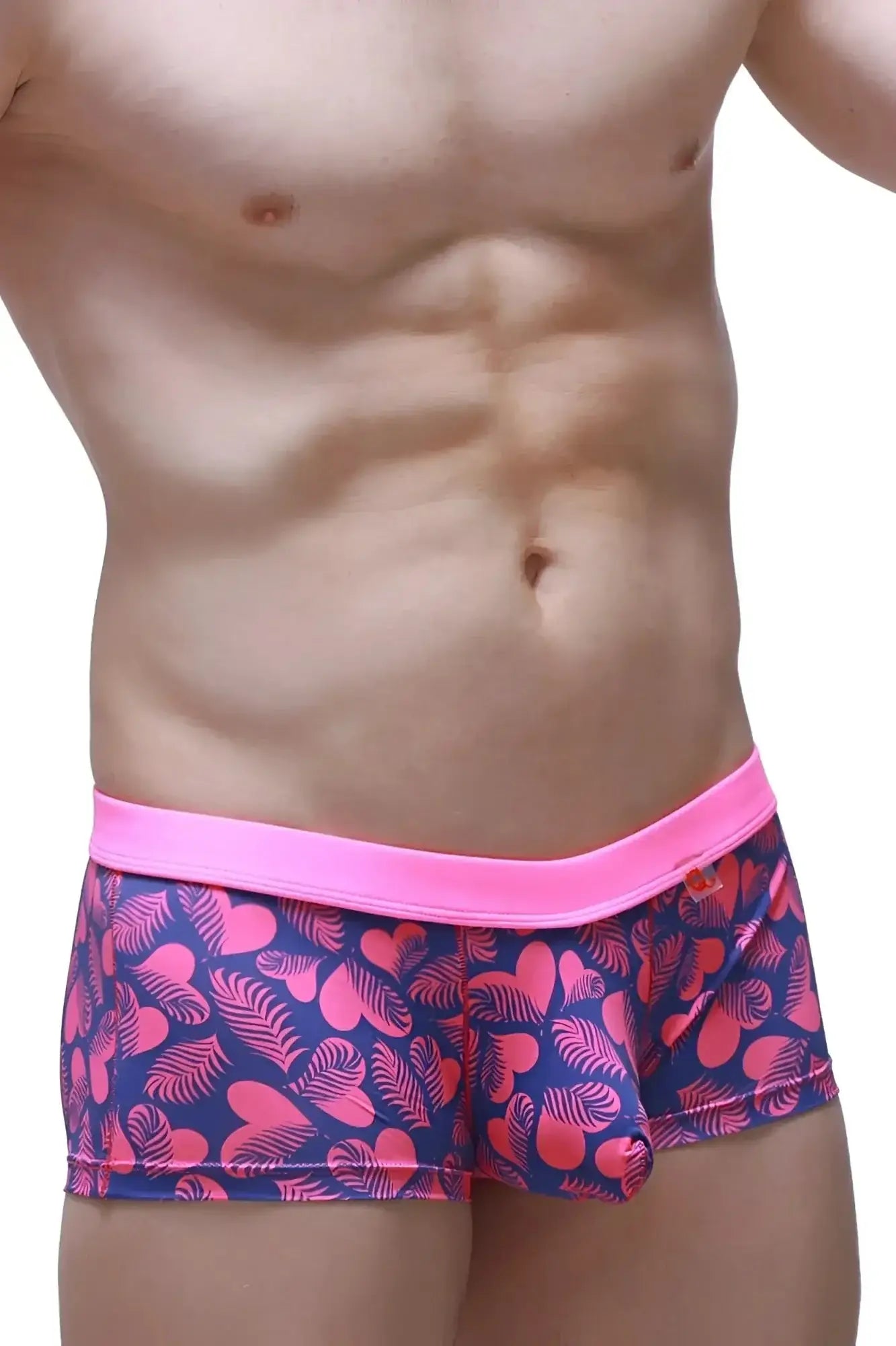 PetitQ boxer Meljac tropical hearts pink and navy blue patterned swim trunks with bright pink elastic waistband