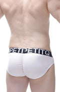 White men’s briefs with black elastic waistband featuring petipetitq logo in bold white letters petitq brief bulan plum white