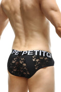 Black lace-trimmed briefs with a bold white petitq waistband showcasing the petitq brief herm lace black design