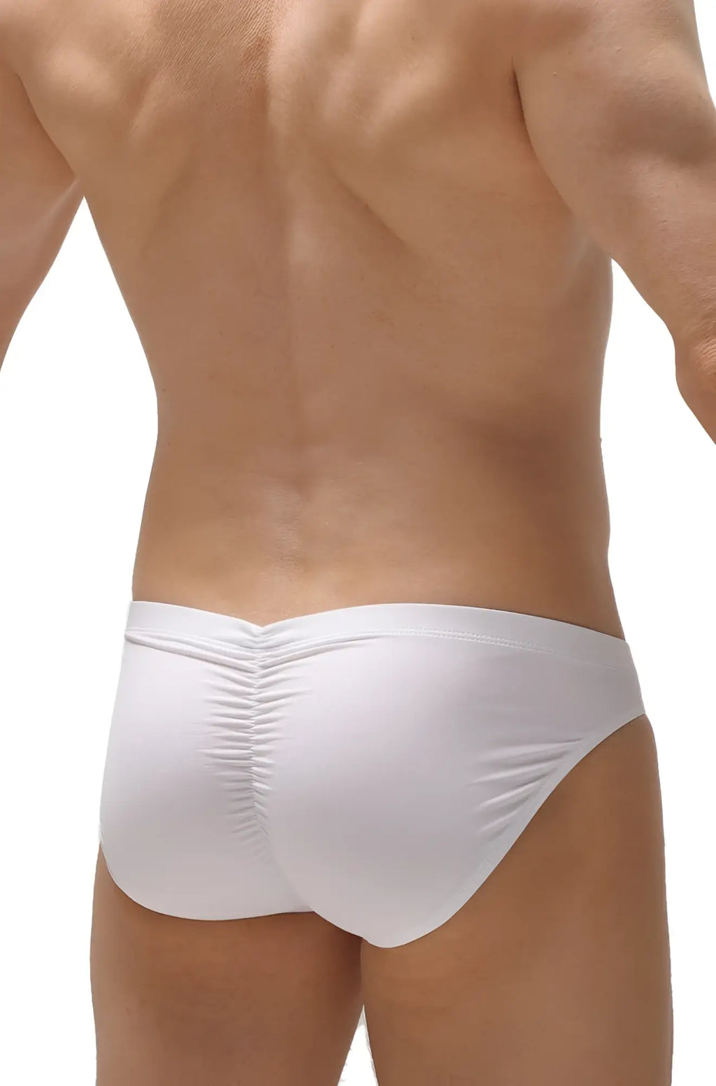 White petitq brief peraut swim trunks with form-fitting fit and ruched back design shown from the back side