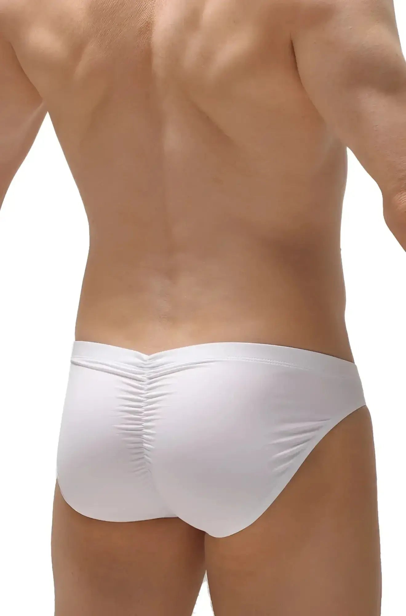 White petitq brief peraut swim trunks with form-fitting fit and ruched back design shown from the back side