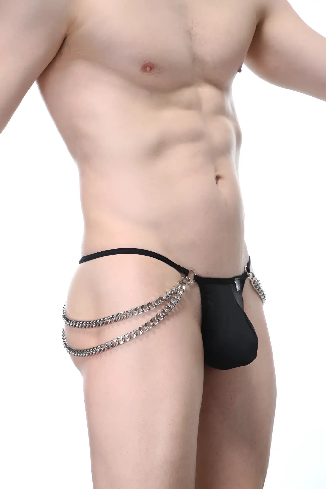 Black mesh thong with silver chain detailing by PetitQ G-string Chains Seiya shown from the back side