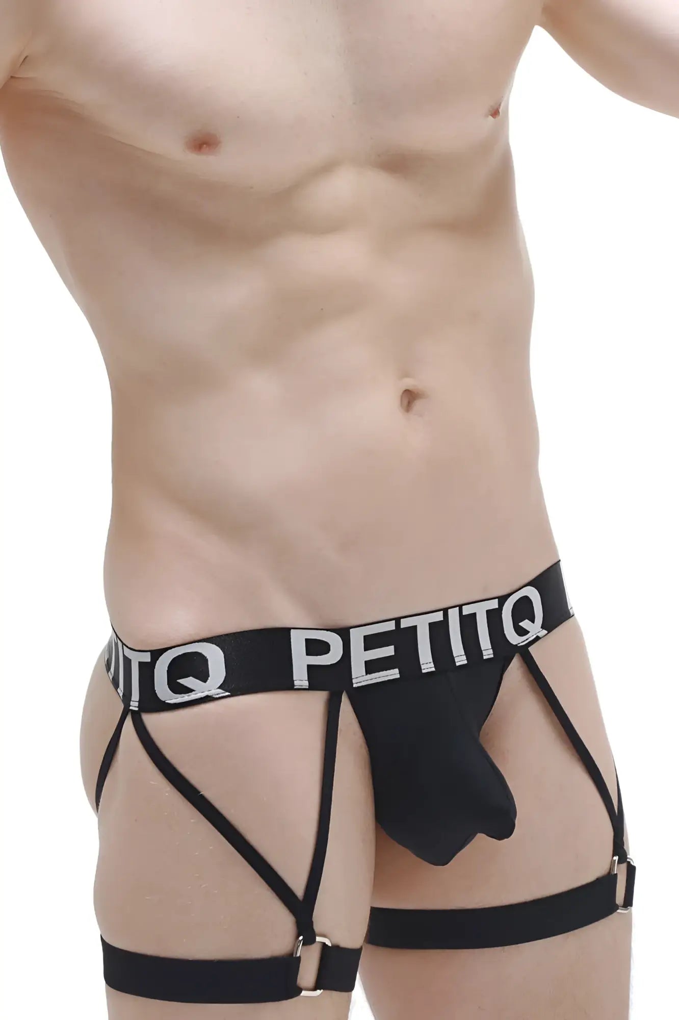 Black petitq men’s briefs with a supportive strappy design and white lettering on the waistband in petitq g-string garter carys style