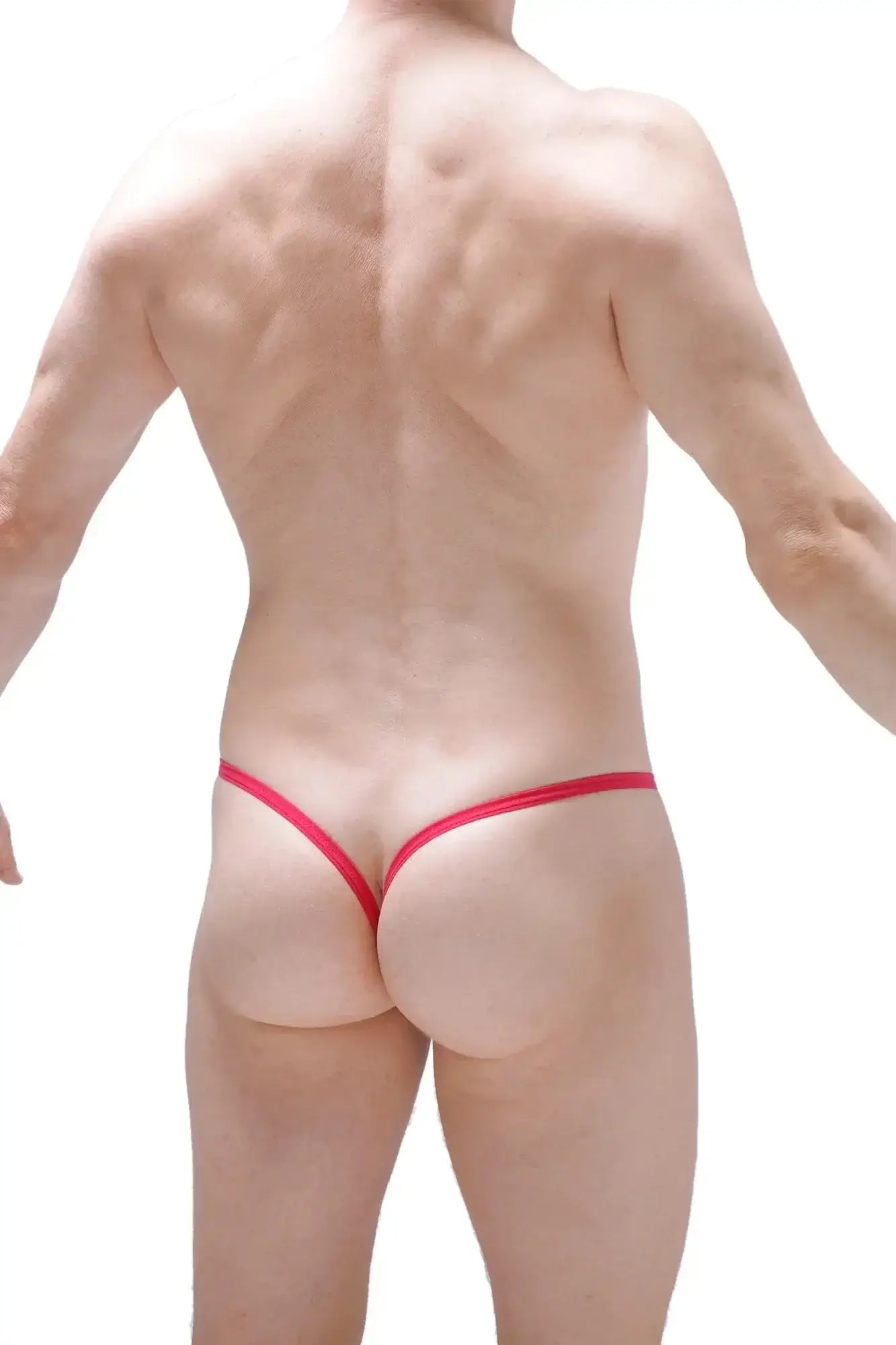 Petitq g-string joeuf net in fuchsia with a red thong and thin elastic band shown from the back side