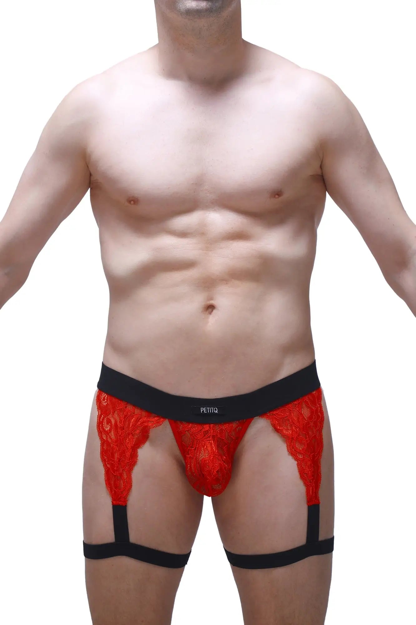 Red lace men’s briefs with black elastic waistband and leg straps from PetitQ g-string lurris lace red collection