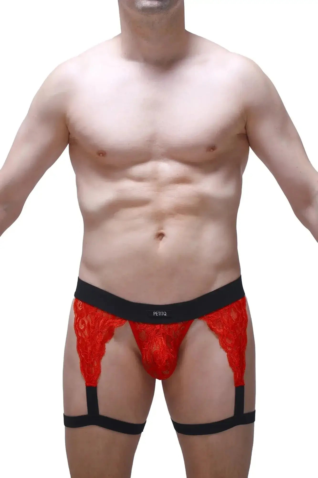 Red lace men’s briefs with black elastic waistband and leg straps from PetitQ g-string lurris lace red collection