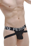 Black petitq jockstrap with sheer mesh front and bold white lettering on waistband from petitq arlas net collection