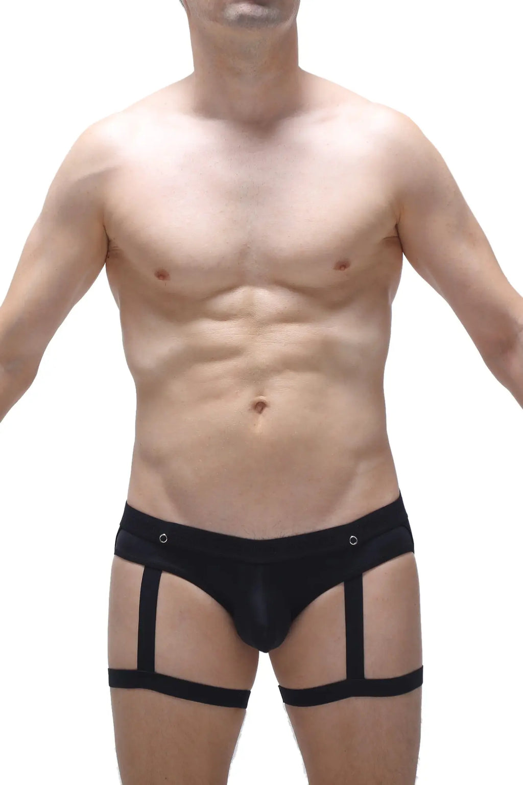 Petitq jockstrap garter black in form-fitting briefs style with strappy design and metallic grommets at waistband